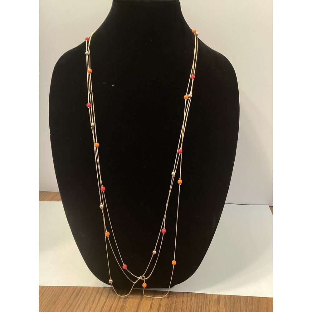 Charming Charlie Gold Necklace with Orange and Red Beads